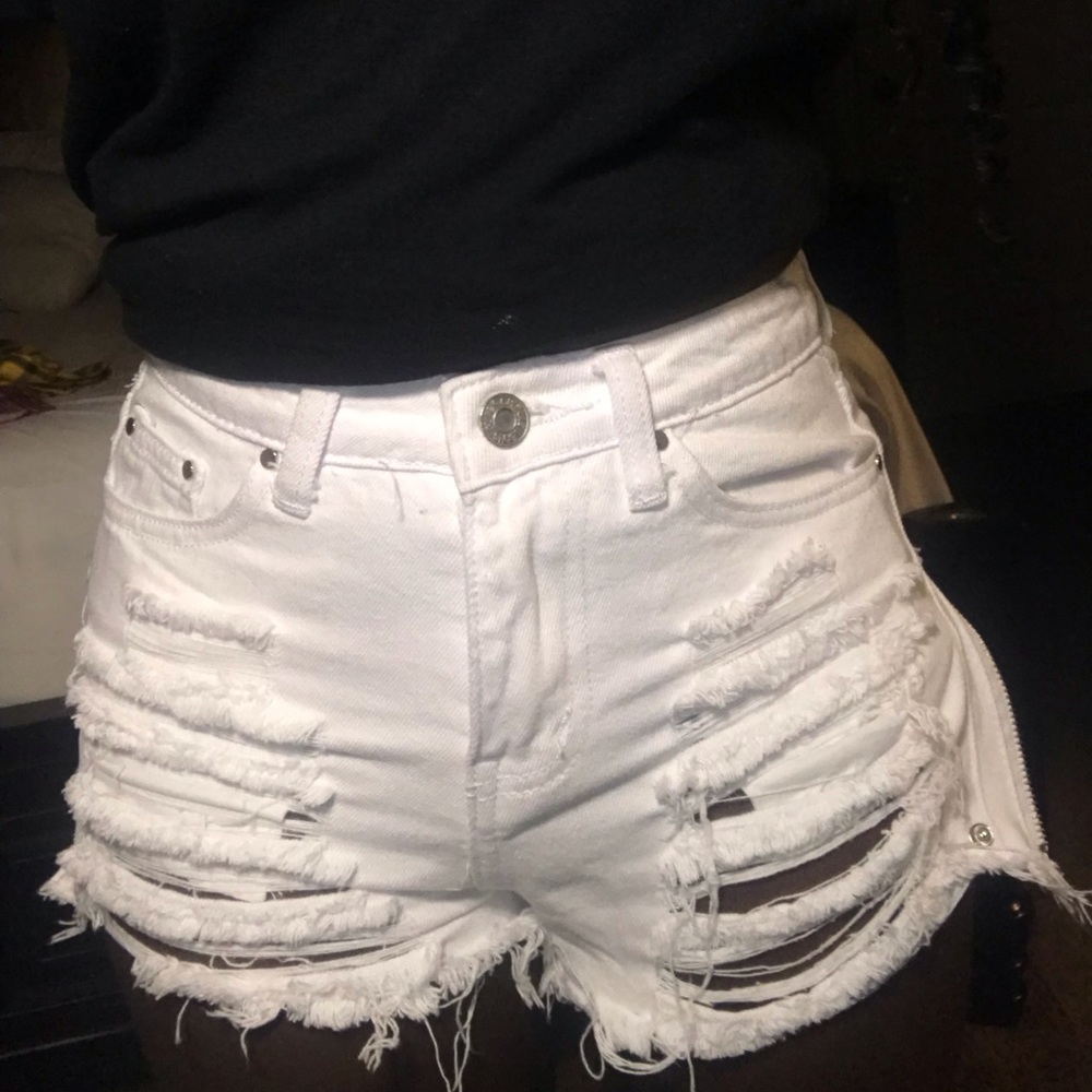 White ripped booty shorts